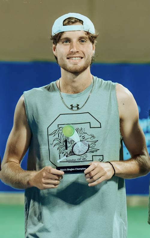 Toby Samuel with the trophy at Soma Bay
