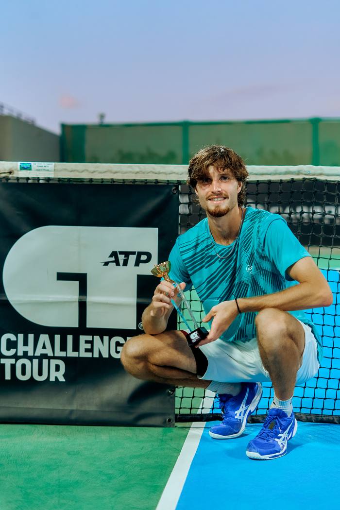 Toby Samuel with the trophy at Soma Bay